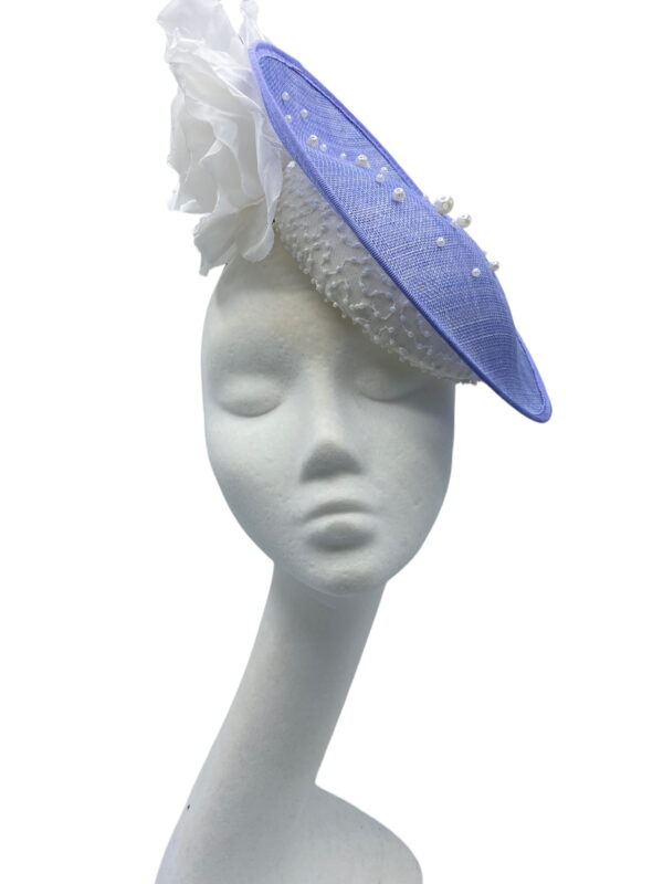 Baby blue headpiece with ivory and pearl base detail.